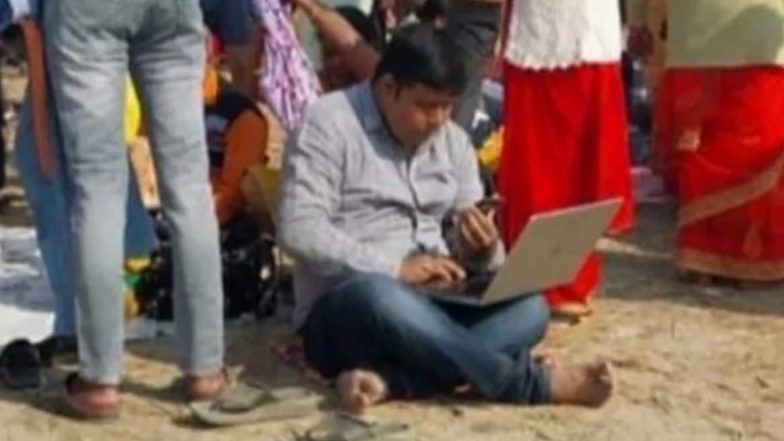 WFH From Mahakumbh: कुंभ में लैपटॉप पर काम करने वाले शख्स की पोस्ट वायरल, यूजर्स ने कहा- 'मोक्ष और सैलरी दोनों एक साथ'