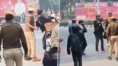 VIDEO: प्रयागराज में बीच सड़क पर वकील की दरोगा ने कर दी पिटाई, रास्ता बंद करने को लेकर हुई थी बहस, मारपीट का वीडियो आया सामने