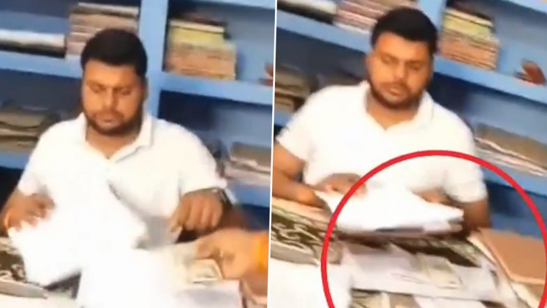 VIDEO: जमीन पैमाइश के नाम पर लेखपाल ने ली रिश्वत, फाइल के बीच से पैसे लेने का वीडियो आया सामने, उत्तर प्रदेश के गोंडा के तहसील क्षेत्र की घटना
