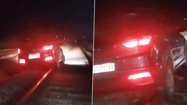 VIDEO: नशे में धुत शख्स ने रेलवे ट्रैक पर चढ़ाया SUV, 35 मिनट तक रुकी रही मालगाड़ी; यूपी के अमरोहा की घटना