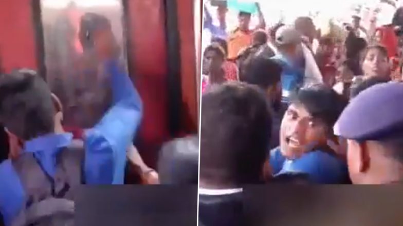 महाकुंभ जाने वाली ट्रेन के शीशे तोड़ रहा था शख्स, आरपीएफ के जवान ने एक पल में उतार दिया सारा भूत (Watch Viral Video)