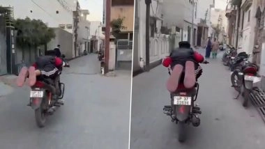 VIDEO: रील बनाने के लिए बाइक पर जानलेवा स्टंट, सुपरमैन बनकर चला रहा है गाड़ी, पुलिस ने लगाया 20 हजार रूपए का जुर्माना, हापुड़ का वीडियो आया सामने