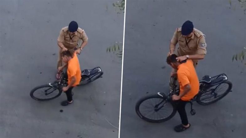 Viral Video: सूरत में VVIP रिहर्सल रूट में घुसने पर पुलिस अधिकारी ने लड़के को पीटा, वीडियो देख भड़के नेटिज़न्स