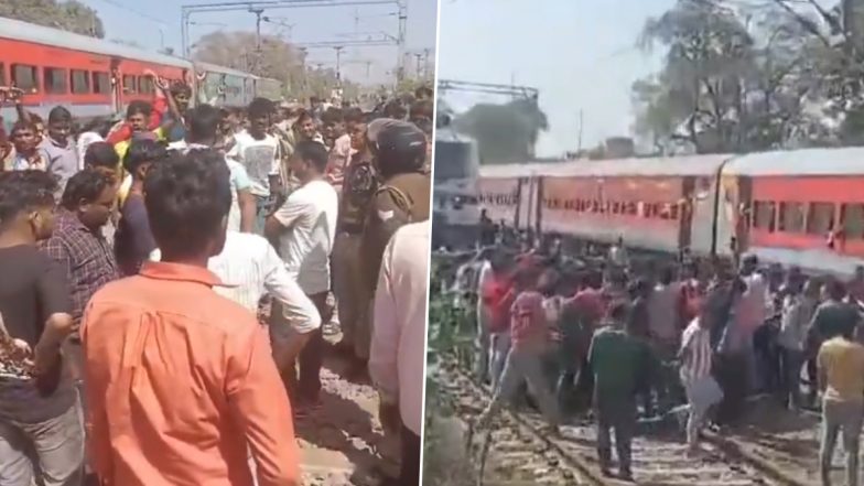 Barabanki Railway Station: ट्रेन को घंटों रोकने से गुस्साएं यात्री, बाराबंकी में ट्रैक पर किया यात्रियों ने हंगामा, दो दिन से सफ़र में थे लोग (Watch Video)