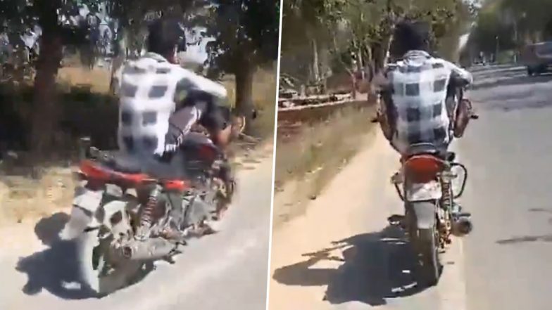 Viral Video: हाईवे पर जानलेवा स्टंट! हाथ छोड़कर पैरों को बाइक के हैंडल पर रखकर युवक चला रहा है गाड़ी, आगरा का वीडियो देखने के बाद भड़के लोग