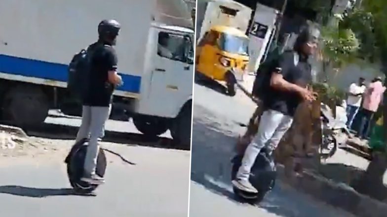 Bengaluru Man Rides Unicycle Through Traffic: बेंगलुरु की सड़कों पर दिखा अजीब नजारा! ट्रैफिक के बीच एक पहिए वाली साइकिल चलाता दिखा शख्स, वायरल वीडियो पर मिले मजेदार रिएक्शन