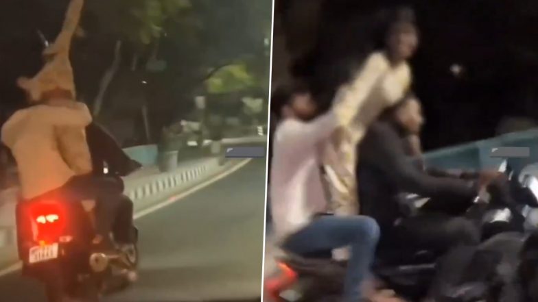 Viral Video: बाइक पर दो लड़कों के बीच बैठकर नशे में धुत्त पापा की परी ने मचाया हुडदंग, लड़की की हरकतें देख भड़के लोग