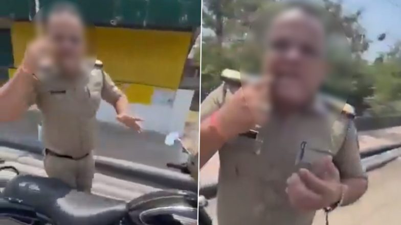 Nagpur Police constable Video: नागपुर में पुलिस की दादागिरी! शख्स ने हेलमेट पहनने के लिए बोला तो कॉन्स्टेबल ने जड़ दिए थप्पड़, सोशल मीडिया पर वायरल हुआ वीडियो