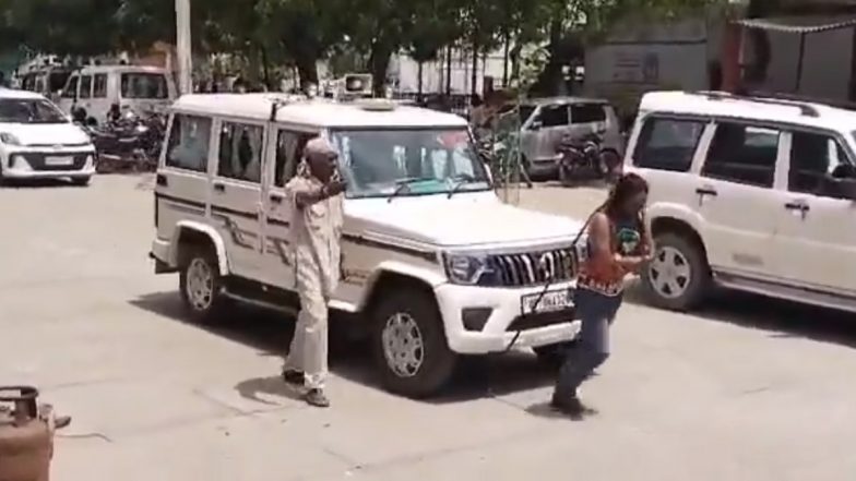 Kaushambi Video: कौशांबी में SDM की गाड़ी को करतब दिखानेवाले शख्स ने बालों से खींचा, अधिकारी कुर्सी पर बैठकर देखते रहे तमाशा