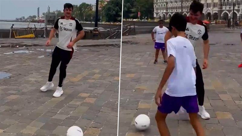 Harry Maguire Plays Football On Streets of Mumbai: मुंबई की गलियों में बच्चों संग फुटबॉल खेलते दिखे हैरी मैग्वायर, मैनचेस्टर यूनाइटेड दौरे पर भारत में छाए स्टार खिलाड़ी