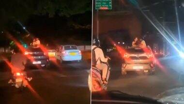 Viral Video: बेंगलुरु में कपल को कार के सनरूफ से खड़े होकर किस करना पड़ा भारी, पुलिस ने लगाया इतना जुर्माना