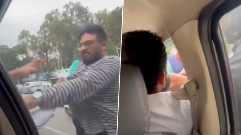 Bengaluru Road Rage: ओवरटेक करने के कारण हुआ विवाद, कार चालक ने कैब ड्राइवर के साथ की मारपीट, बेंगलुरु का वीडियो आया सामने (Watch Video)