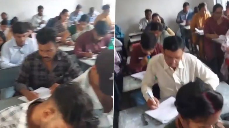 Cheating in Dindori College: मध्य प्रदेश की शिक्षा का बेहाल! डिंडोरी के कॉलेज में टेबल पर किताबें और मोबाइल से छात्र कर रहे है नकल, वीडियो आया सामने (Watch Video)