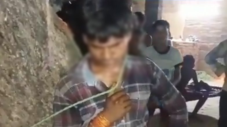Raebareli Shocker: रायबरेली जिले में दबंगों का आतंक! गांव में आम बेचने आए दलित युवक को पेड़ से बांधकर पीटा, सोशल मीडिया पर वीडियो आया सामने (Watch Video)