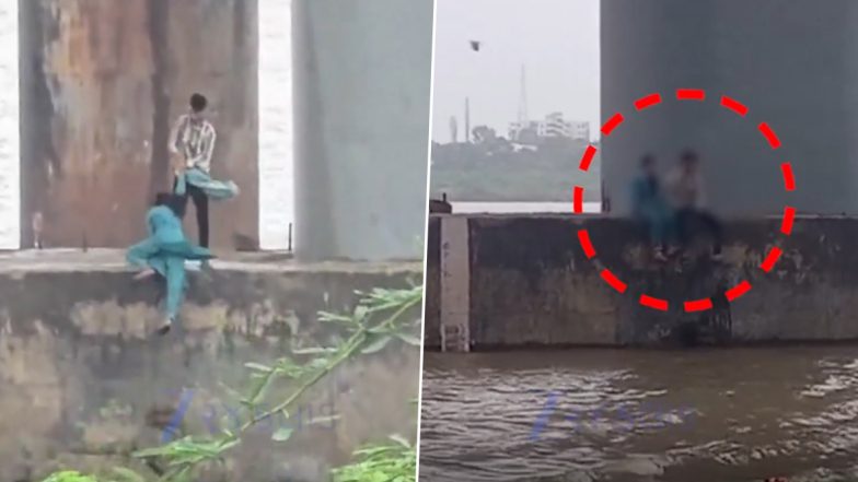 Couple Was Rescued: नर्मदा नदी के ब्रिज के पिलर के नीचे जा बैठा कपल, जलस्तर बढ़ने से दोनों फंसे, लोगों ने किया रेस्क्यू, गुजरात के भरूच का वीडियो आया सामने;VIDEO