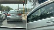नोएडा में बीयर खरीदने के लिए रेड लाइट पर कार खड़ी कर गया शख्स, Video वायरल हुआ तो देना पड़ा जुर्माना