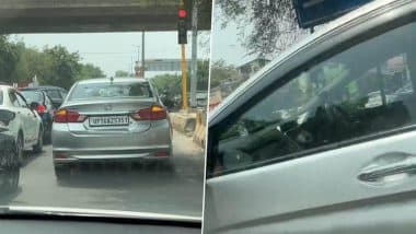 नोएडा में बीयर खरीदने के लिए रेड लाइट पर कार खड़ी कर गया शख्स, Video वायरल हुआ तो देना पड़ा जुर्माना