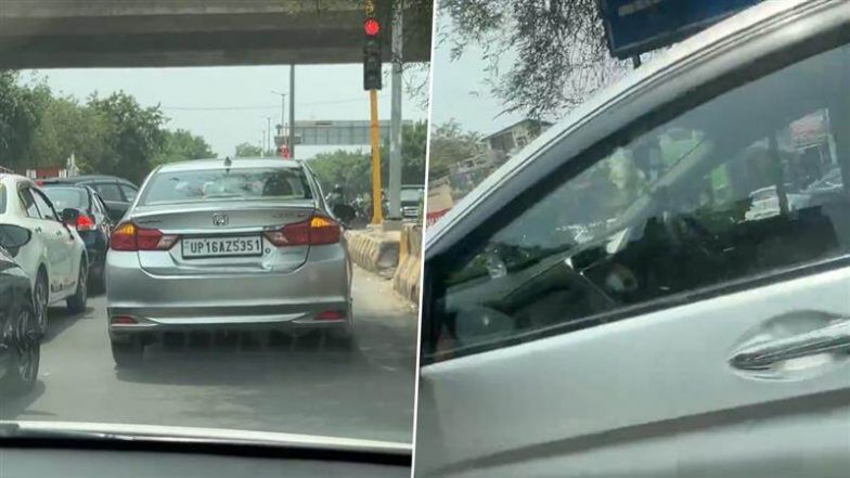 नोएडा में बीयर खरीदने के लिए रेड लाइट पर कार खड़ी कर गया शख्स, Video वायरल हुआ तो देना पड़ा जुर्माना