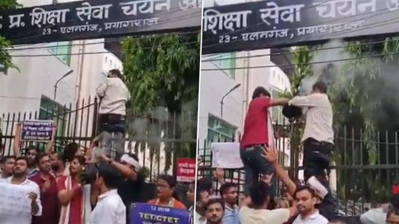 VIDEO: शिक्षा सेवा चयन बोर्ड के गेट पर टांगी काली मटकी, नींबू-मिर्च दिखाकर उतारी नजर; प्रयागराज में DElEd अभ्यर्थियों का अनोखा प्रोटेस्ट