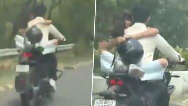 Noida Couple Romance Video: कपल को बाइक पर रोमांस करना पड़ा महंगा, वीडियो वायरल होने पर नोएडा ट्रैफिक पुलिस ने काटा ₹53,500 का चालान
