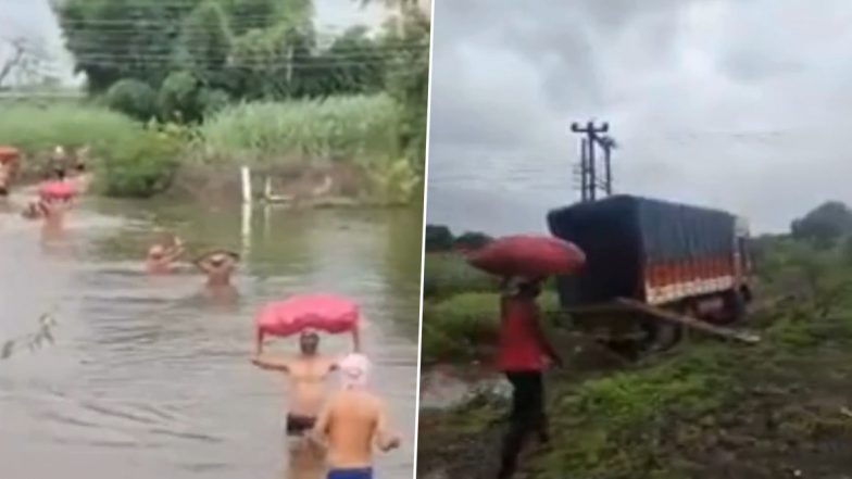 VIDEO: किसान की मज़बूरी.. प्याज की बोरियों को छाती तक पानी से ले जा रहे है, सातारा के खटाव तहसील में ब्रिज नहीं होने की वजह से परेशान हुए लोग