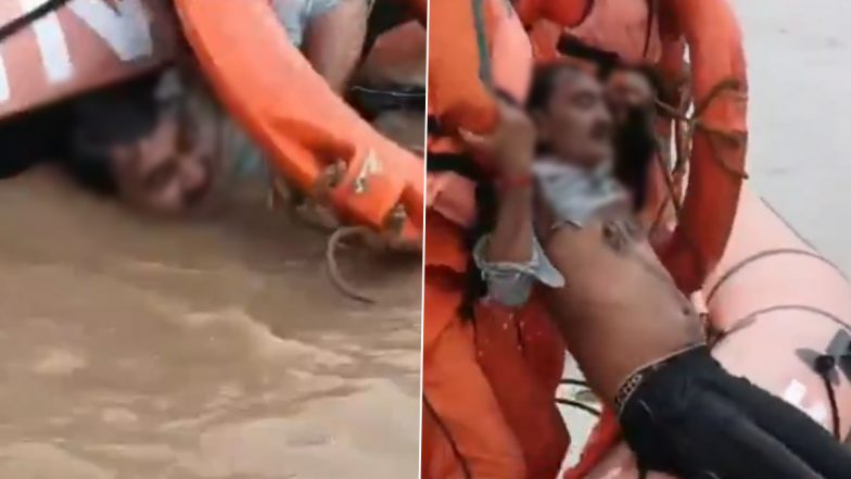 Varanasi Shocker: आत्महत्या के लिए गंगा नदी के पुल से शख्स ने लगाई छलांग, NDRF की टीम ने बचाई जान, वाराणसी का वीडियो आया सामने;VIDEO