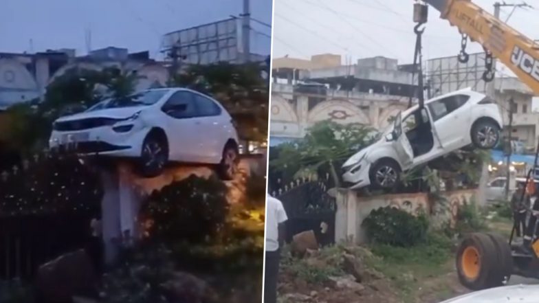 Viral Video: नशे में धुत ड्राइवर ने हैदराबाद के पास घर की बाउंड्री के ऊपर चढ़ाई कार, क्रेन से नीचे उतारी गाड़ी