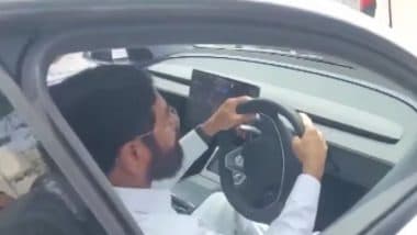 Ekanath Shinde Driving Tesla: महाराष्ट्र विधानसभा परिसर में उपमुख्यमंत्री एकनाथ शिंदे ने लिया टेस्ला कार का टेस्ट ड्राइव, आदित्य ठाकरे ने कही ये बात (Watch Video)