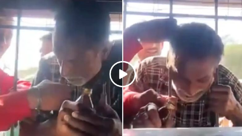 Viral Video: 'जाम' लेने के चक्कर में खुद 'जाम' हो गया सिर, शराब के ठेके की ग्रिल में फंसा शख्स का गला