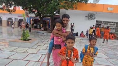 VIDEO में देखें आस्था और प्रेम की अनूठी मिसाल: दिव्यांग पति को कंधों पर बैठाकर हरिद्वार पहुंची पत्नी, दक्षिणेश्वर महादेव में किया जलाभिषेक
