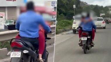 VIDEO: पुणे की सड़कों पर प्यार की स्टंटबाजी! चलती बाइक पर रोमांस का वीडियो वायरल VIDEO: पुणे की सड़कों पर प्यार की स्टंटबाजी! चलती बाइक पर रोमांस का वीडियो वायरल