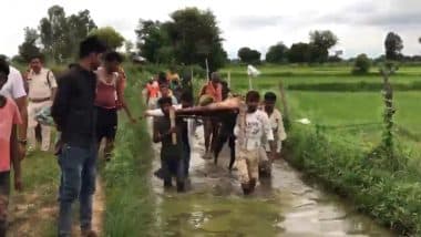MP Shocker: बच्चे की मौत के बाद पोस्टमार्टम के लिए खटिया पर हॉस्पिटल ले जाना पड़ा शव, सतना जिले का सिस्टम की पोल खोलता वीडियो आया सामने; VIDEO
