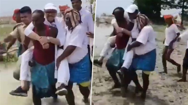 Bihar Flood: कटिहार में ग्रामीणों की पीठ पर सवार होकर बाढ़ निरीक्षण करते दिखे सांसद तारिक अनवर, वीडियो वायरल होने के बाद कांग्रेस ने दी सफाई