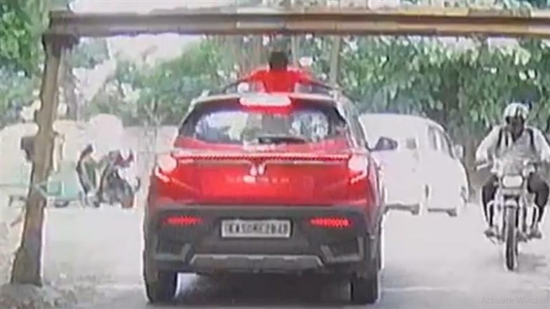 Bengaluru Horror: कार के सनरूफ से बाहर निकले लड़के का सिर बैरियर टकराया, हैरान करने वाला वीडियो वायरल