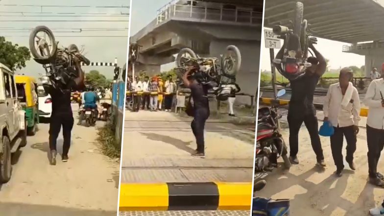 Jhansi: रेलवे फाटक था बंद, शख्स ने बाइक को कंधे पर उठाकर किया पार, झांसी में बॉडी बिल्डर को देखकर लोग हैरान; VIDEO