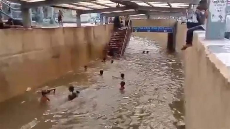 Gurugram Rains: भारी बारिश के चलते गुरुग्राम में अंडरपास सबवे बना स्विमिंग पूल, पानी में मजे से तैरते और मस्ती करते दिखे बच्चे (Watch Video)