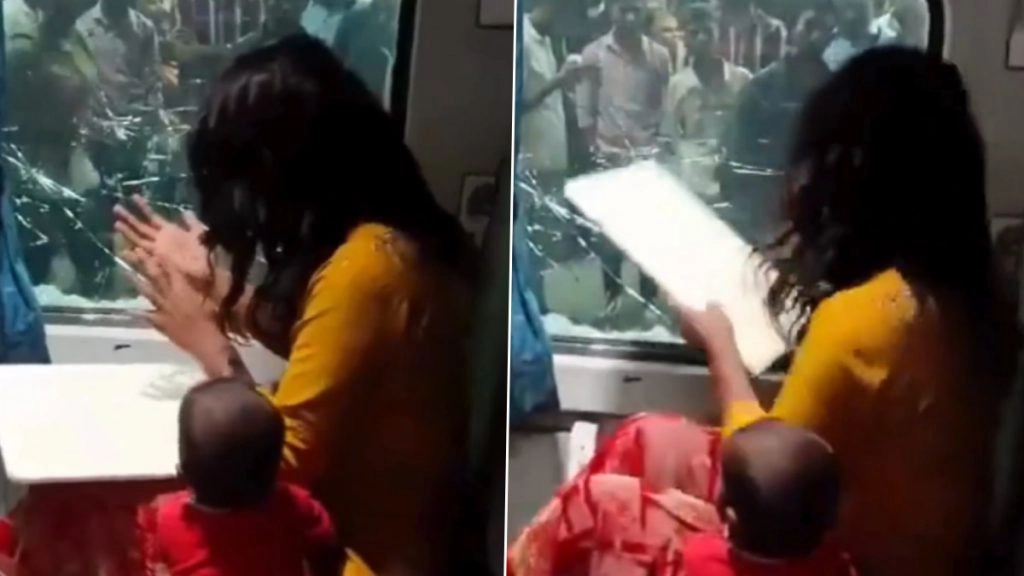 महिला का पर्स चोरी होने पर महिला ने एसी कोच कर कांच ही तोड़ दिया.