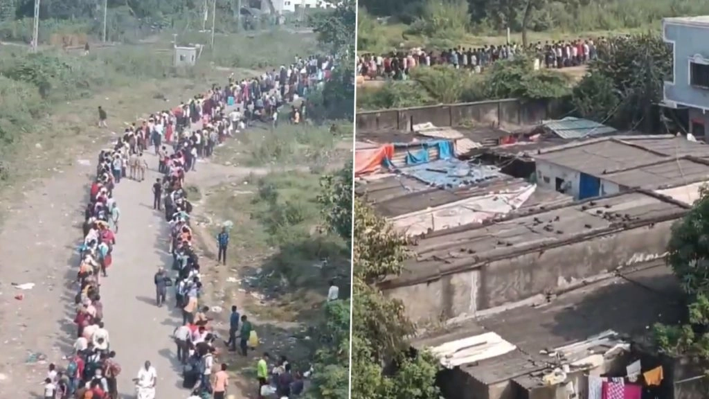 सूरत के उधना रेलवे स्टेशन के बाहर लगी यात्रियों की भीड़.