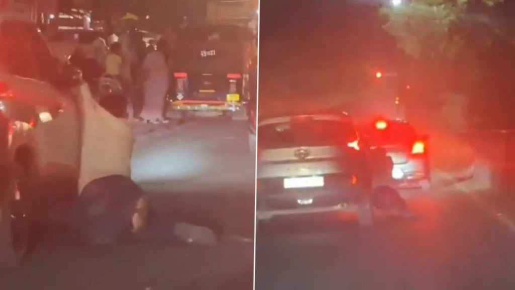 लातूर में कार के दरवाजे से लटकाकर शख्स को कार सवार ने कई दूर तक घसीटा.