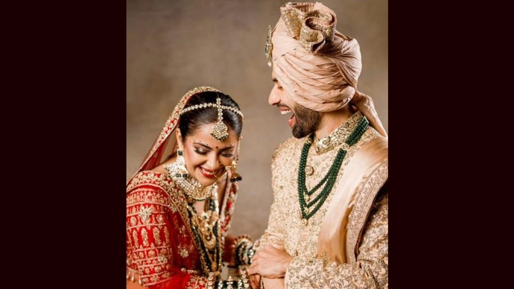 अविका गौर ने पोस्ट की शादी की खूबसूरत तस्वीरें, मेहंदी में नाम ढूंढते नजर आए पति मिलिंद