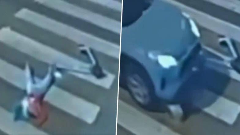 Viral Video: ट्रैफिक लाइट पर भयानक दुर्घटना, इलेक्ट्रिक स्कूटर से गिरी 18 वर्षीय महिला को ड्राइवर ने रौंदा