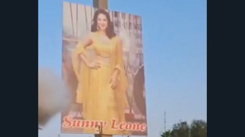 Sunny Leone Pictures in the Field: खेत में लगा दिए सनी लियोनी के पोस्टर्स.. फसल को बुरी नजर से बचाने के लिए किसान का अनोखा टोटका, कर्नाटक के वीडियो ने मचाई हलचल: VIDEO