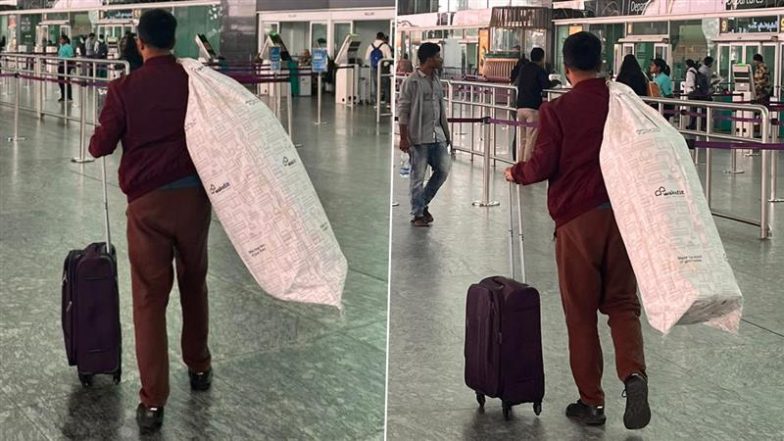 Viral Video: इंडिगो की देरी के बीच बेंगलुरु एयरपोर्ट पर गद्दे के साथ पहुंचा यात्री, मजेदार वीडियो हुआ वायरल
