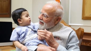 PM Modi: पीएम नरेंद्र मोदी ने नन्हे ओमी को गोद में लिया, सोशल मीडिया पर वायरल हुआ दिल छू लेने वाला पल