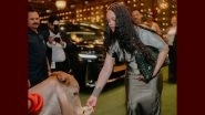 Rihanna Cow Feeding Pic: गाय को चारा खिलाते हुए मशहूर सिंगर रिहाना की तस्वीर सोशल मीडिया पर वायरल, 4.3 लाख के काफस्किन डियोर बैग पर भड़के यूजर्स; लोगों ने किया ट्रोल