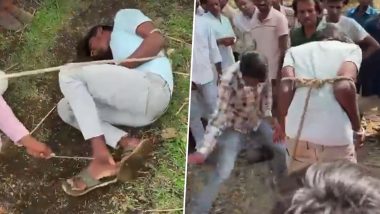 MP Horror: मध्य प्रदेश के राजगढ़ में अमानवीयता की हदें पार, चोरी के शक में युवक को ट्रैक्टर से बांधकर लोगों ने पीटा, मामले में 4 लोग गिरफ्तार (Watch Video)