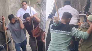 Mount Girnar Viral Video: गिरनार पर्वत पर इंसान को पालकी में ले जाने के वीडियो पर छिड़ी ऑनलाइन बहस; लोग दो गुटों में बंटे