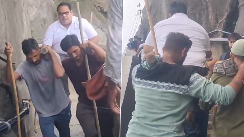 Mount Girnar Viral Video: गिरनार पर्वत पर इंसान को पालकी में ले जाने के वीडियो पर छिड़ी ऑनलाइन बहस; लोग दो गुटों में बंटे