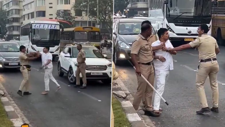 Mumbai Police Viral Video: मरीन ड्राइव पर शख्स और पुलिसकर्मियों के बीच बहस का वीडियो वायरल, सोशल मीडिया पर कार्रवाई की उठी मांग